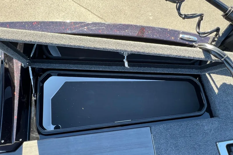 Slide: The Image of Open storage compartment on 2026 Vexus DVX20S boat, showcasing interior design. - 9