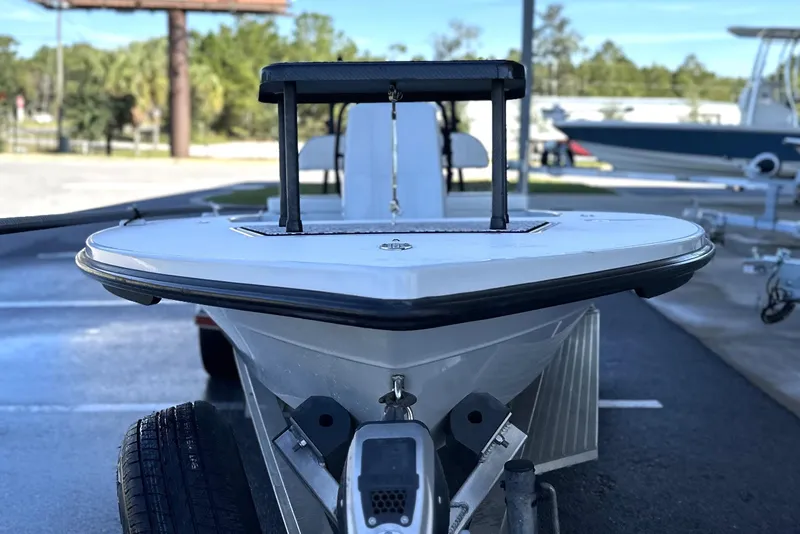 Slide: The Image of 2021 Maverick 18 HPX-V boat on trailer, front view in outdoor setting. - 6