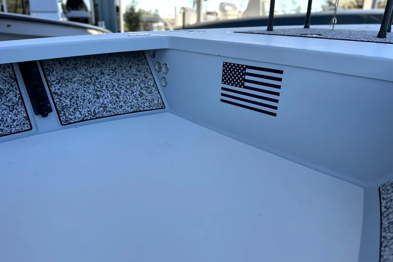 Slide: The Image of 2021 Maverick 18 HPX-V boat interior with American flag decal. - 7