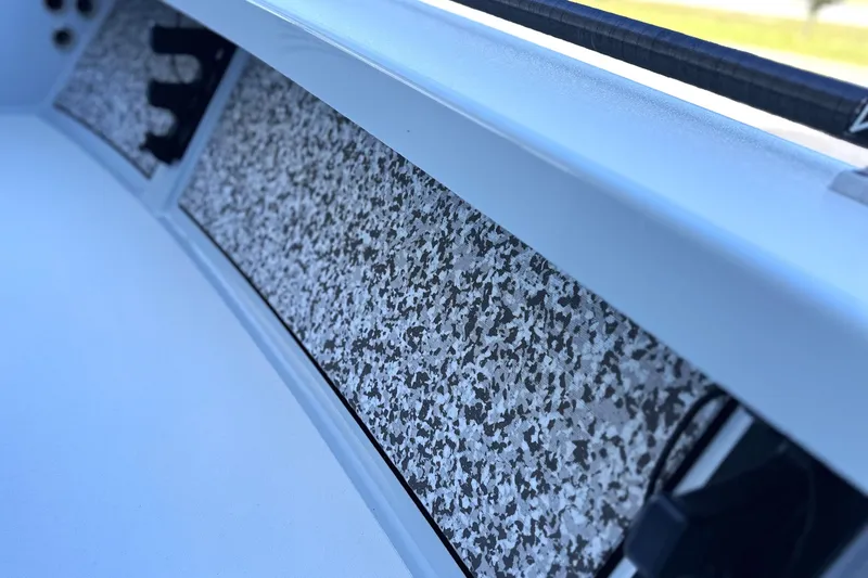 Slide: The Image of 2021 Maverick 18 HPX-V boat interior with speckled design detail. - 9