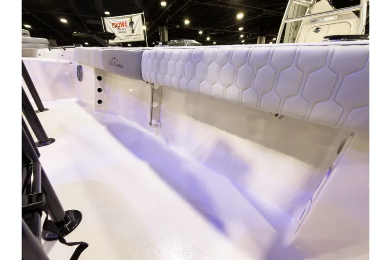 Slide: The Image of 2026 Sea Chaser 23 LX boat interior with hexagonal upholstery design. - 14