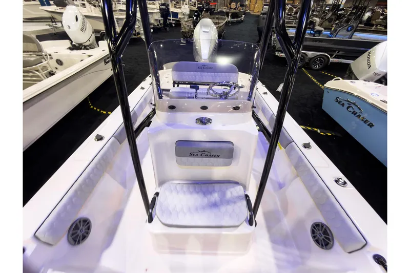 Slide: The Image of 2026 Sea Chaser 23 LX boat interior at a marine exhibition. - 16