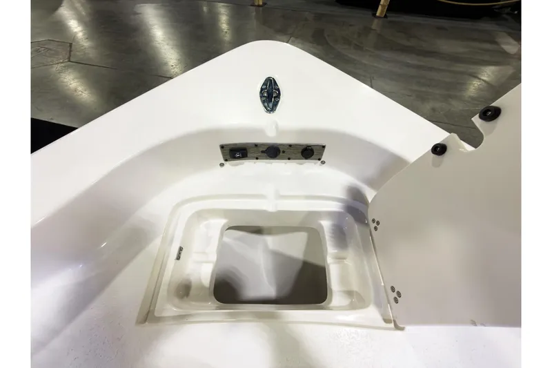 Slide: The Image of 2026 Sea Chaser 23 LX boat interior detail with storage compartment. - 18