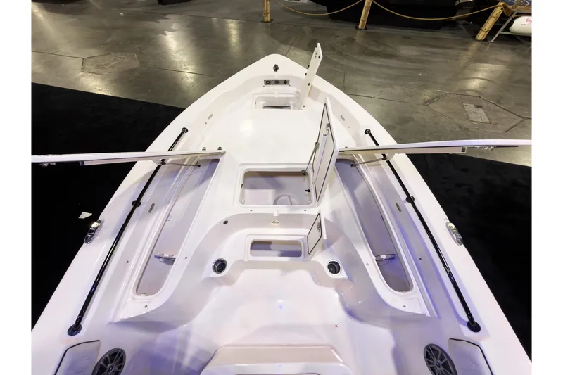 Slide: The Image of 2026 Sea Chaser 23 LX boat interior, showcasing storage compartments and sleek design. - 19