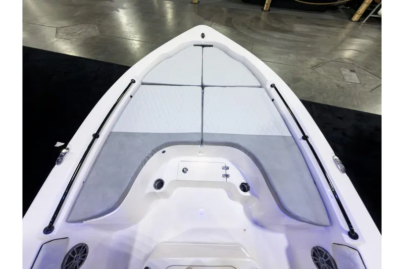 Slide: The Image of Bow view of 2026 Sea Chaser 23 LX boat with cushioned seating. - 22