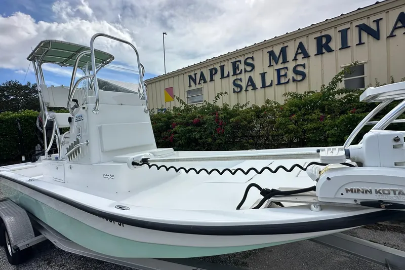 Slide: The Image of 2020 Shallow Sport 24 Classic boat at Naples Marina Sales, featuring Minn Kota trolling motor. - 3