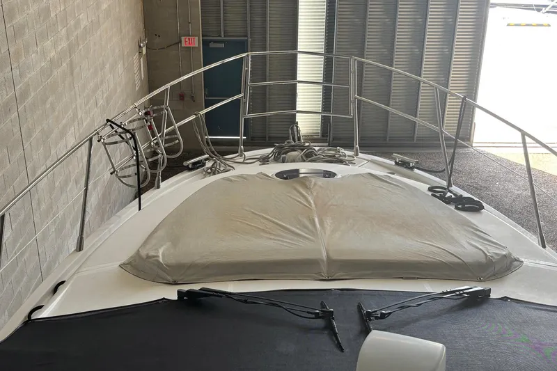 Slide: The Image of 2009 Azimut 43 yacht in storage, covered deck, indoor facility. - 2