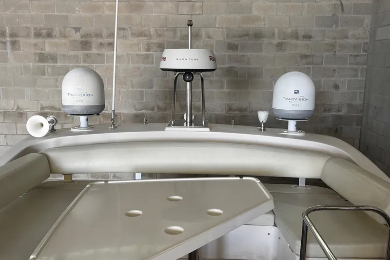 Slide: The Image of 2009 Azimut 43 yacht interior with TracVision satellite systems and seating area. - 7