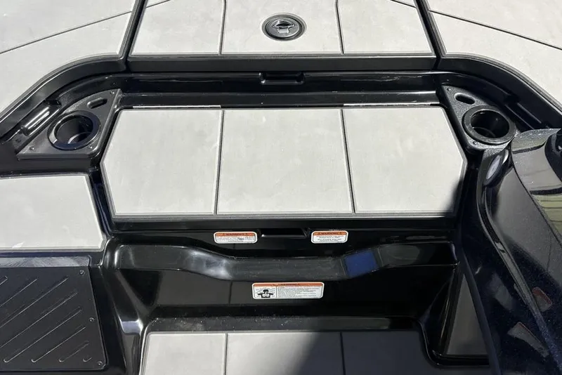 Slide: The Image of 2026 Nitro Z20 XL Pro boat deck with cup holders and storage compartments. - 10