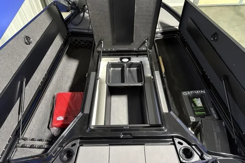 Slide: The Image of Interior storage of 2026 Nitro Z20 XL Pro boat with organized compartments. - 14