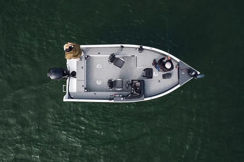 Slide: The Image of 2026 Lund 1800 Explorer SS boat on trailer at Water Werks Boat Sales. - 2