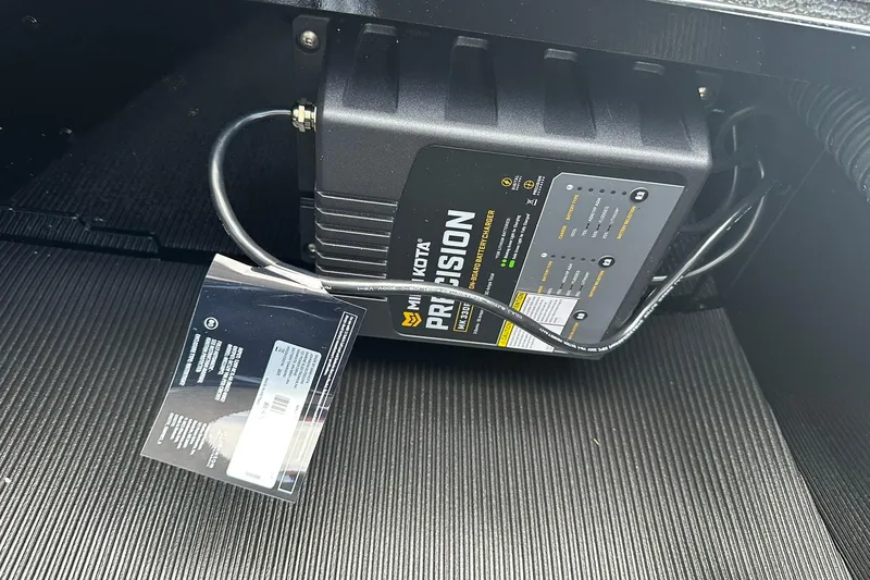 Slide: The Image of Minn Kota Precision battery charger in 2026 Lund 1800 Explorer SS boat. - 26