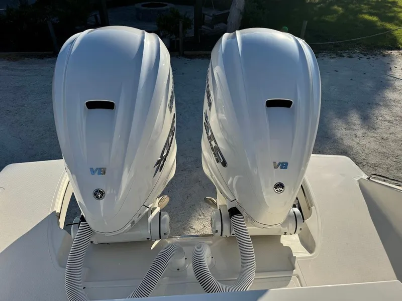 Slide: The Image of 2024 Pursuit S 358 Sport boat with twin V8 engines, rear view. - 33