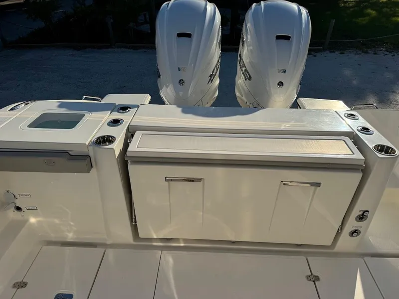 Slide: The Image of 2024 Pursuit S 358 Sport boat with dual engines and sleek deck design. - 34
