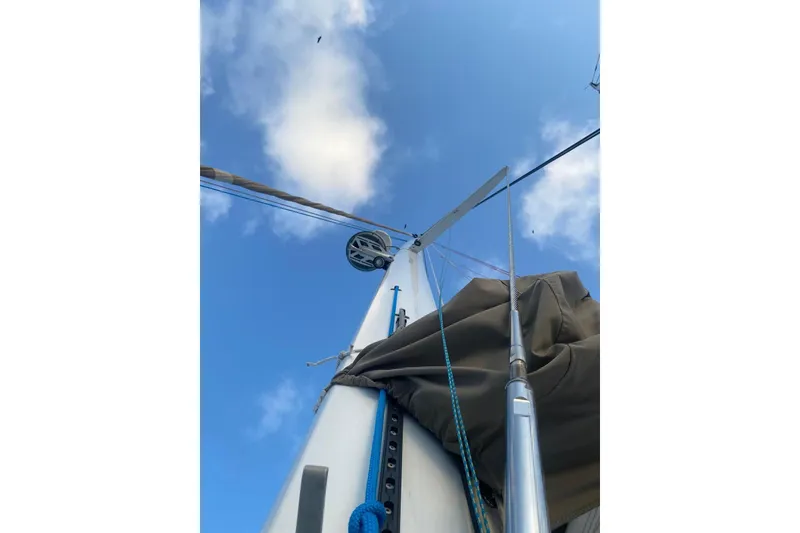 Slide: The Image of Looking up at the mast of a 2014 FONTAINE PAJOT 63 sailboat against a blue sky. - 34