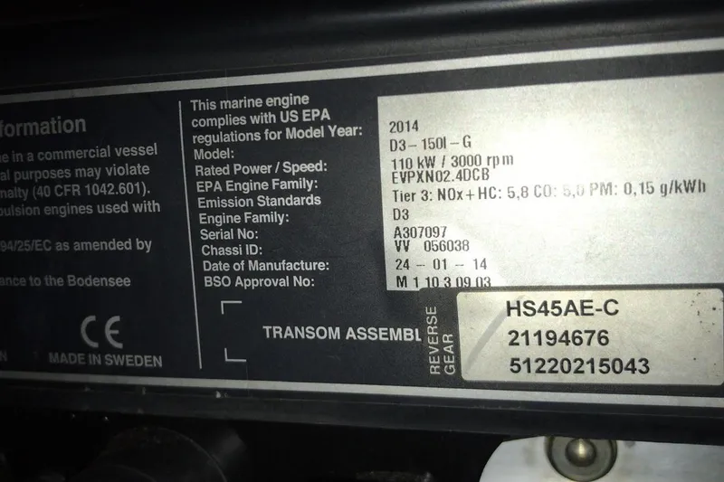 Slide: The Image of Label on a 2014 FONTAINE PAJOT 63 marine engine, showing specifications and compliance details. - 57