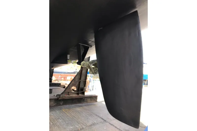 Slide: The Image of Underwater view of 2014 FONTAINE PAJOT 63 yacht rudder and propeller. - 62