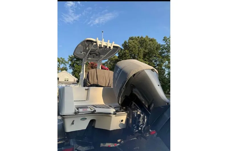 Slide: The Image of 2019 Tidewater 232 CC Adventure boat interior with seating and speakers. - 4