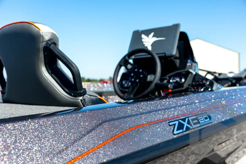 Slide: The Image of 2026 Skeeter ZXE20 boat with glittering finish and modern seating design. - 15