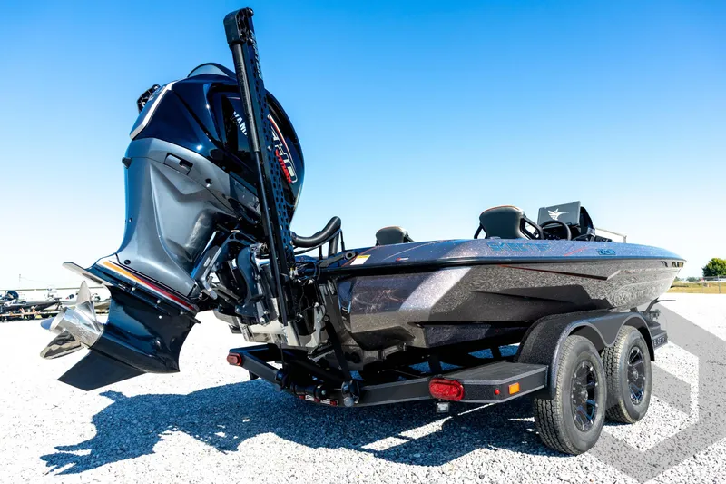 Slide: The Image of 2026 Skeeter ZXE20 boat with powerful outboard motor on a trailer. - 18