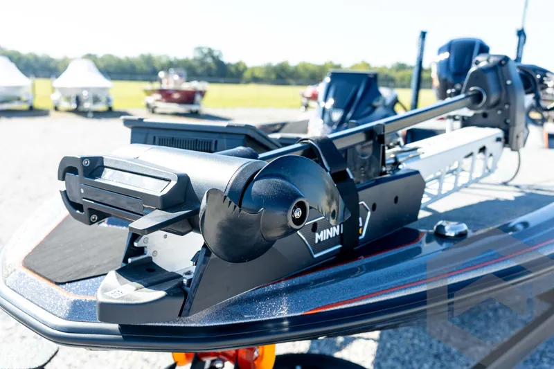 Slide: The Image of 2026 Skeeter ZXE20 boat with Minn Kota trolling motor, outdoor display. - 36