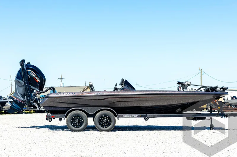 Slide: The Image of 2026 Skeeter ZXE20 boat on trailer, side view, outdoors. - 4