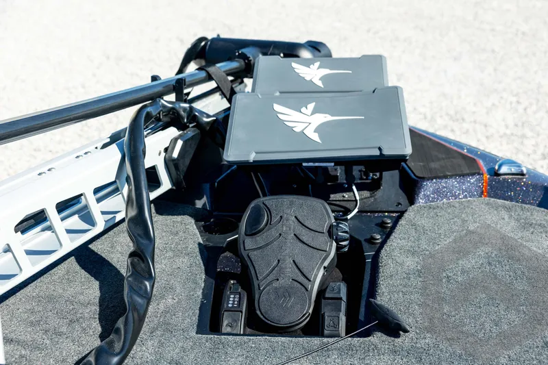 Slide: The Image of 2026 Skeeter ZXE20 boat deck with advanced control panels and foot pedal. - 45