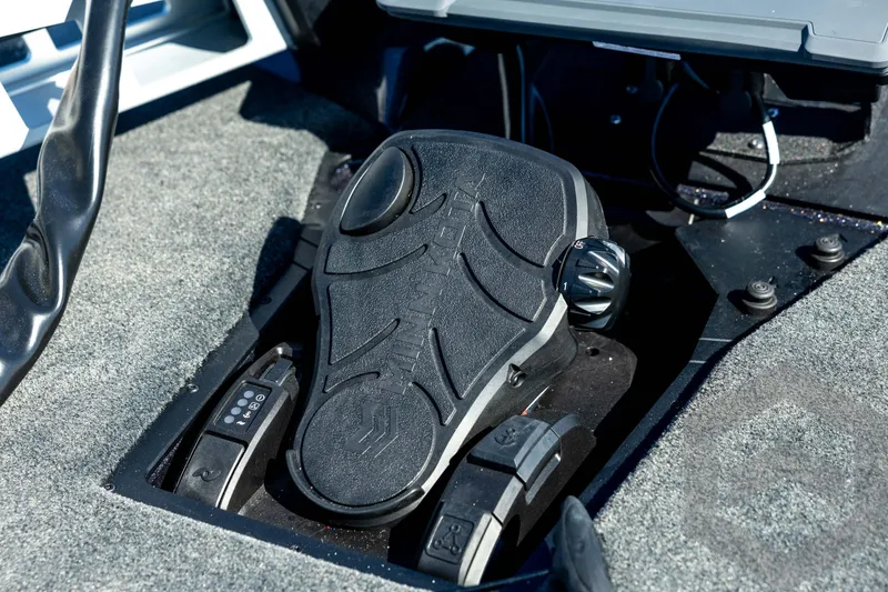Slide: The Image of Foot pedal controls in a 2026 Skeeter ZXE20 boat cockpit. - 46