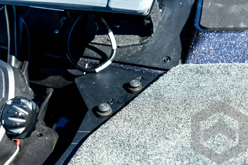 Slide: The Image of Interior view of 2026 Skeeter ZXE20 boat, featuring control panel and textured flooring. - 47