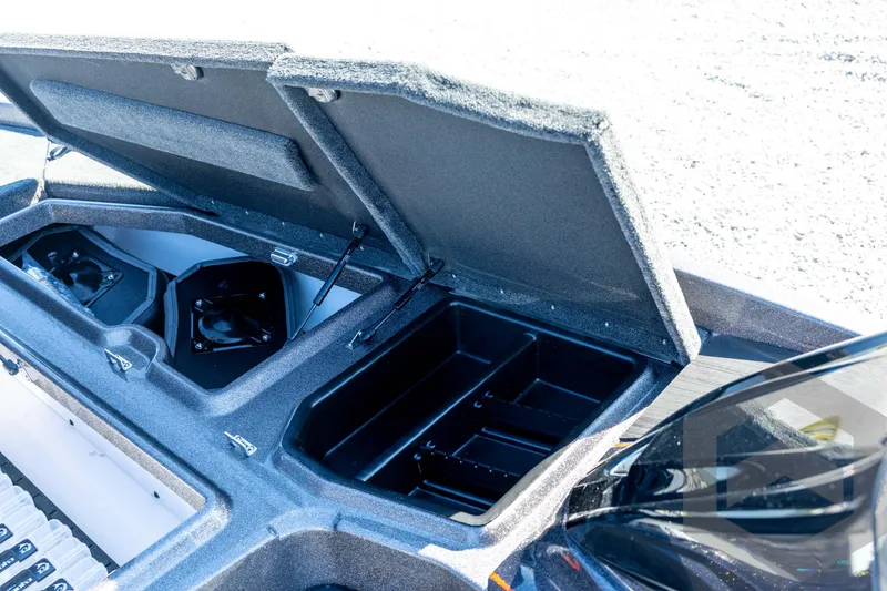 Slide: The Image of 2026 Skeeter ZXE20 boat storage compartments open, showcasing organized interior space. - 53
