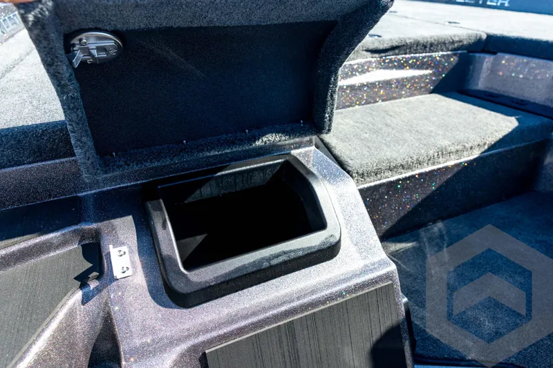 Slide: The Image of Open storage compartment in 2026 Skeeter ZXE20 boat interior. - 57