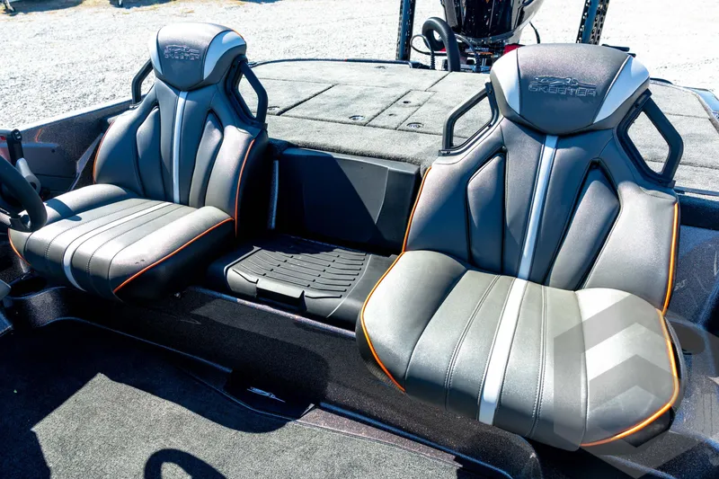 Slide: The Image of 2026 Skeeter ZXE20 boat seats with sleek design and orange accents. - 60
