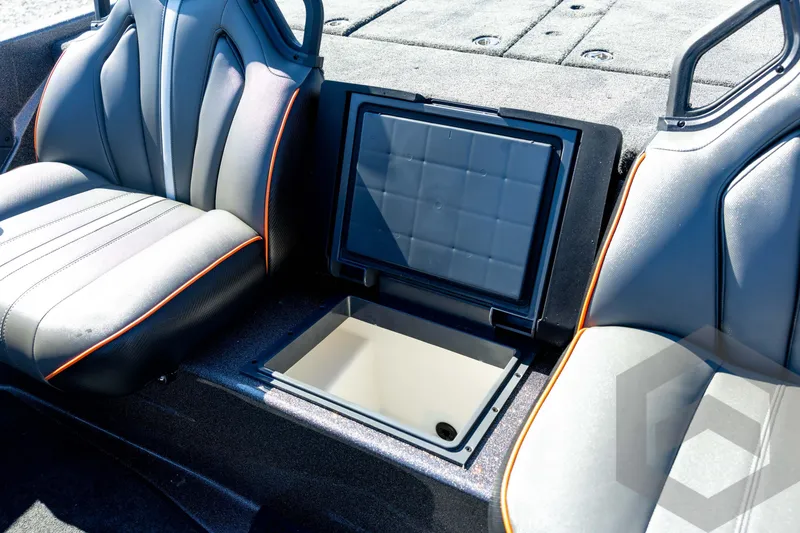 Slide: The Image of 2026 Skeeter ZXE20 boat interior with open storage compartment and sleek seating design. - 61