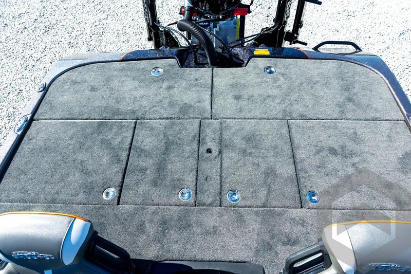 Slide: The Image of 2026 Skeeter ZXE20 boat deck with gray carpet and storage compartments. - 70