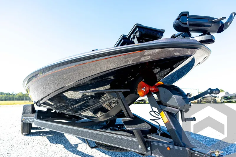 Slide: The Image of 2026 Skeeter ZXE20 boat on trailer, showcasing sleek design and advanced features. - 8