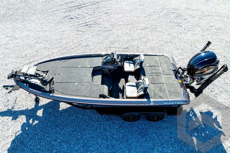 Slide: The Image of 2026 Skeeter ZXE20 fishing boat with dual seats and powerful outboard motor. - 84