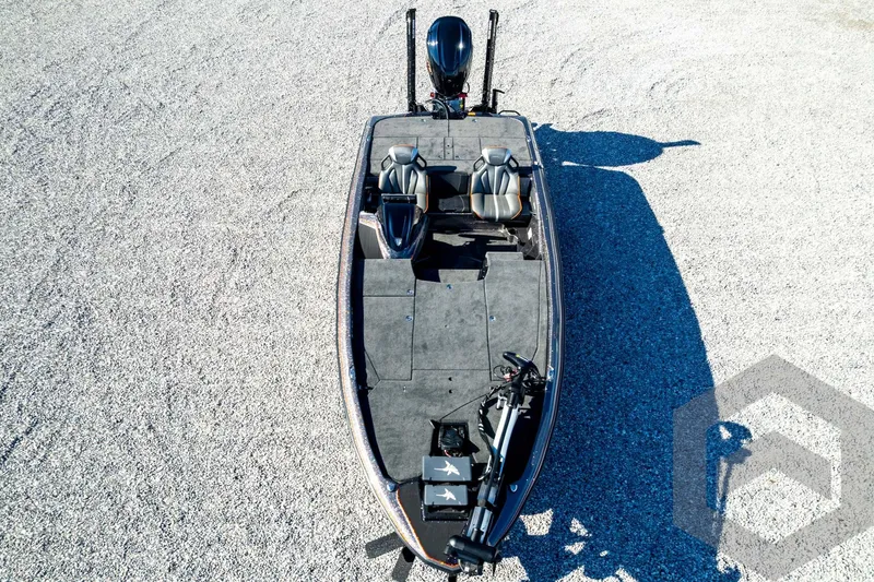 Slide: The Image of 2026 Skeeter ZXE20 fishing boat on gravel, aerial view. - 86