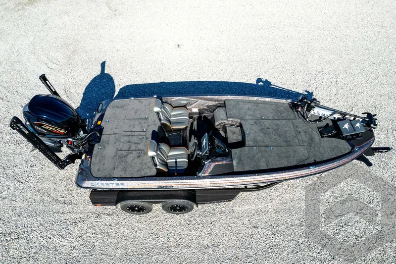 Slide: The Image of 2026 Skeeter ZXE20 fishing boat with Yamaha engine, aerial view on gravel surface. - 88