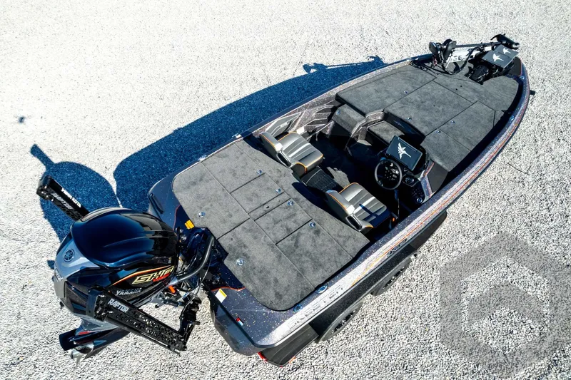 Slide: The Image of 2026 Skeeter ZXE20 fishing boat with Yamaha engine, aerial view on gravel surface. - 89