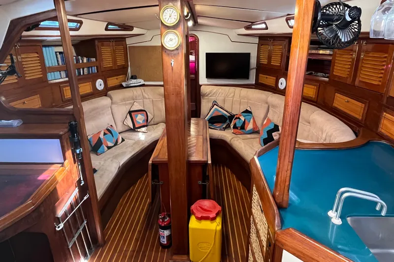 Slide: The Image of Luxurious interior of 1993 Med Marine Montevideo 43 yacht with cozy seating and modern amenities. - 12