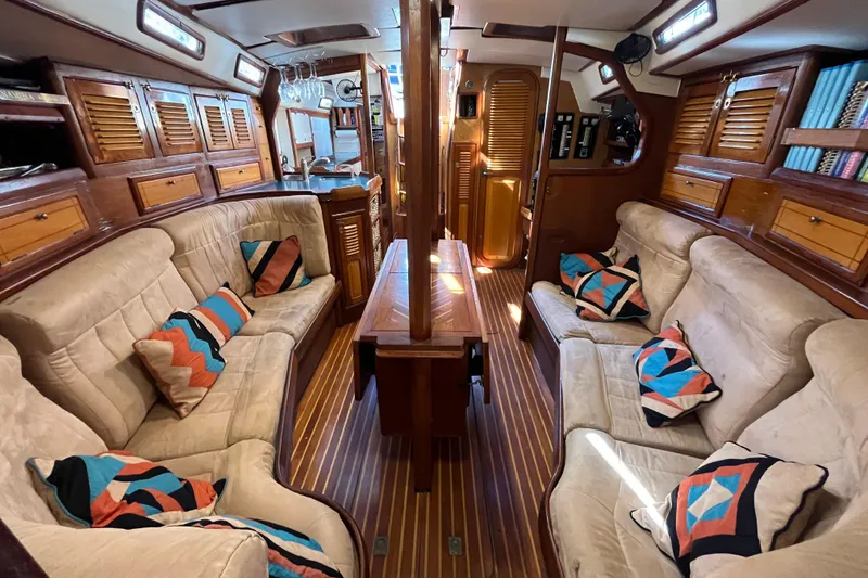 Slide: The Image of Luxurious interior of 1993 Med Marine Montevideo 43 yacht with cozy seating and vibrant cushions. - 22