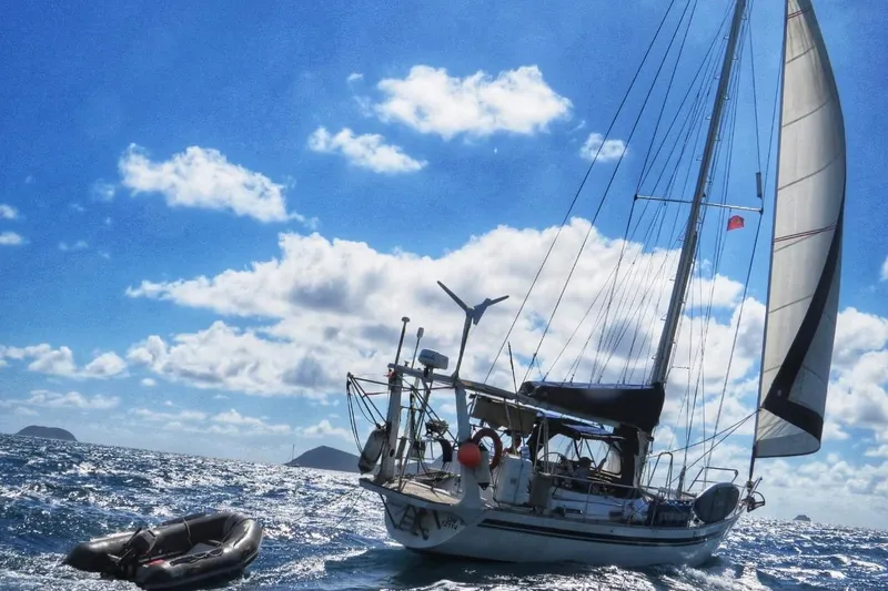 Slide: The Image of Sailing yacht "Montevideo 43" by Med Marine, 1993, navigating ocean waves under a clear sky. - 25