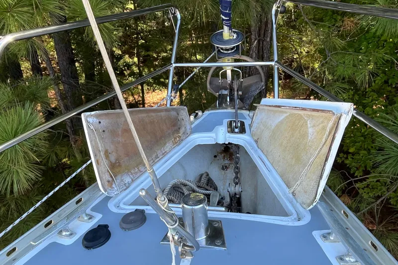 Slide: The Image of Deck view of 1993 Med Marine Montevideo 43 sailboat with open anchor locker. - 4