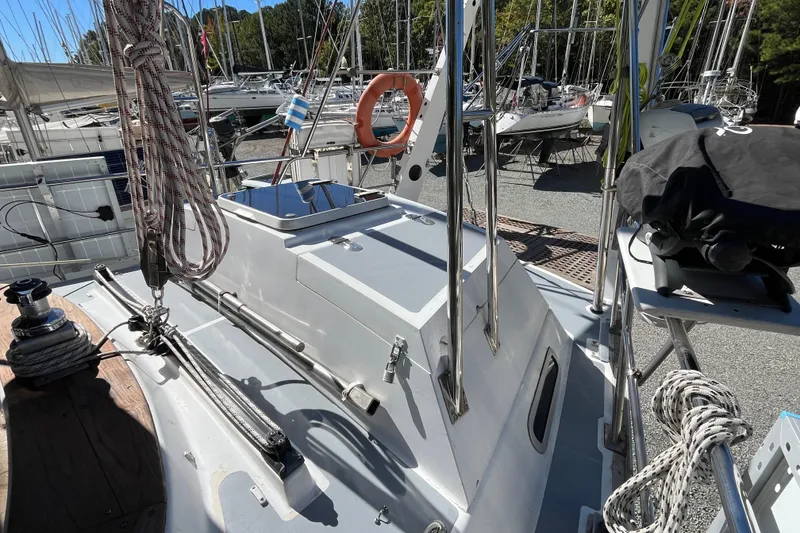Slide: The Image of Deck view of a 1993 Med Marine Montevideo 43 sailboat, featuring rigging and equipment. - 8