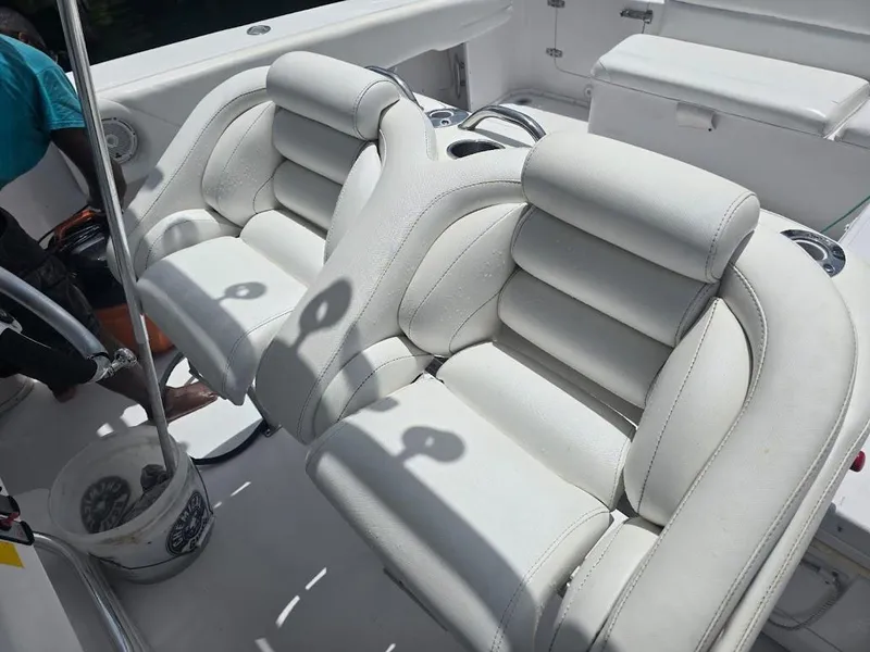 Slide: The Image of Luxury seating on a 2008 Donzi 38 ZSF boat, featuring plush white upholstery. - 5