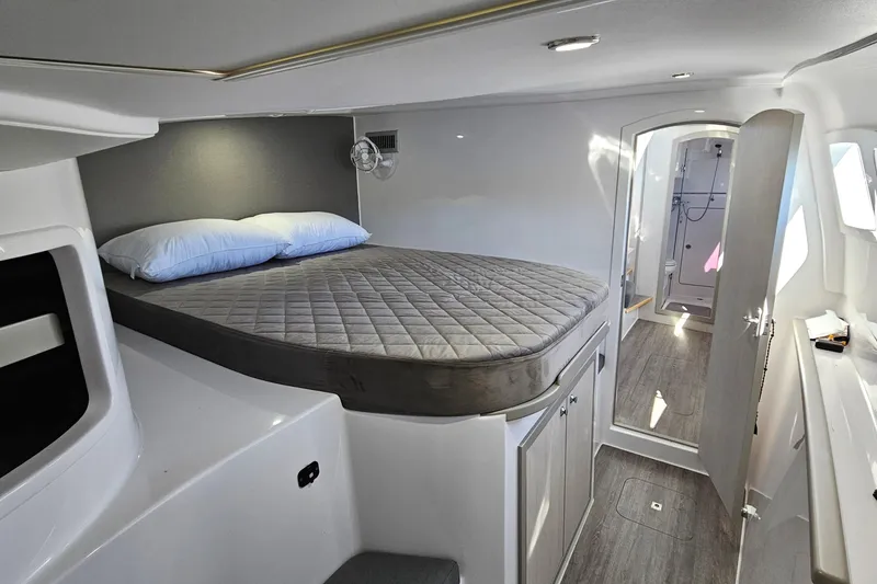 Slide: The Image of Interior of 2022 Seawind 1160 Lite catamaran with cozy bed and modern design. - 7