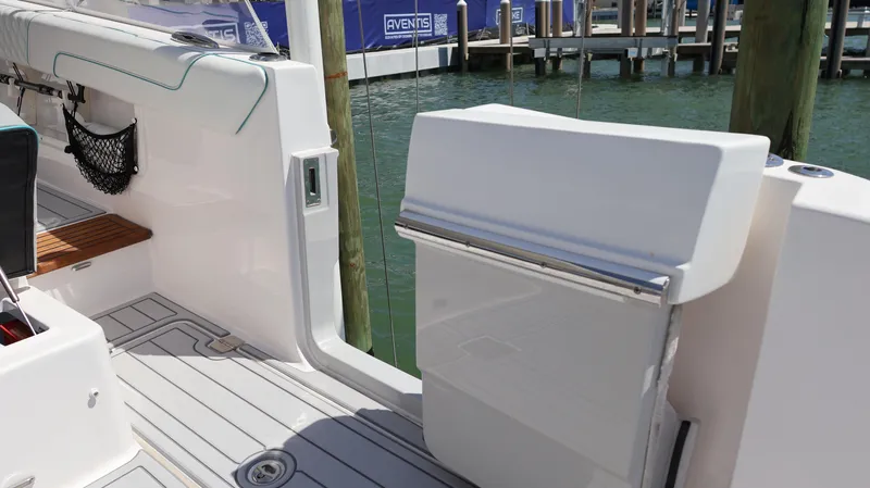 Slide: The Image of 2022 Regal 38 SAV boat interior with open deck and water view. - 26