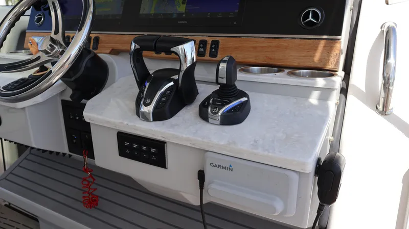 Slide: The Image of Control panel of 2022 Regal 38 SAV boat with Garmin navigation system. - 45
