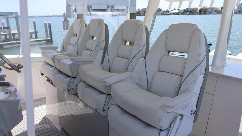 Slide: The Image of Luxurious seating on 2022 Regal 38 SAV boat with ocean view. - 49