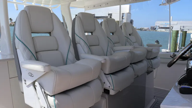 Slide: The Image of Luxurious seating on 2022 Regal 38 SAV boat, featuring plush, ergonomic design. - 50